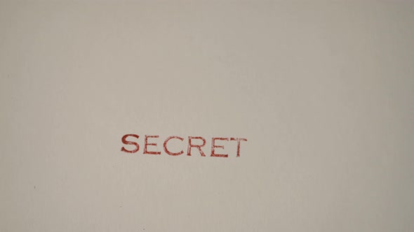 Secret Hand Stamp On White Paper