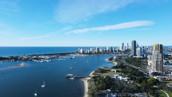 Aerial view looking over the popular suburb Southport and towering city high-rise apartment building alt