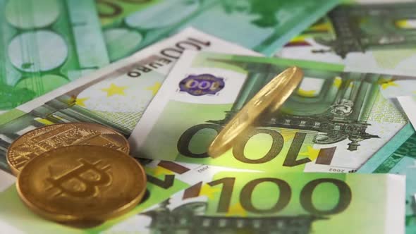 Bitcoin Spins on the Bunch of Hundred-Euro Banknotes