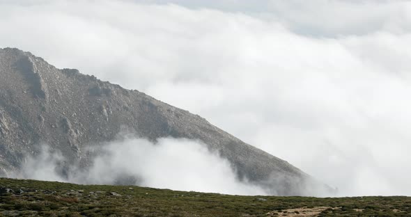White Fluffy Clouds Moving At The Peak Of Serra Da Estrela In Portugal - Scenic View - close up alt