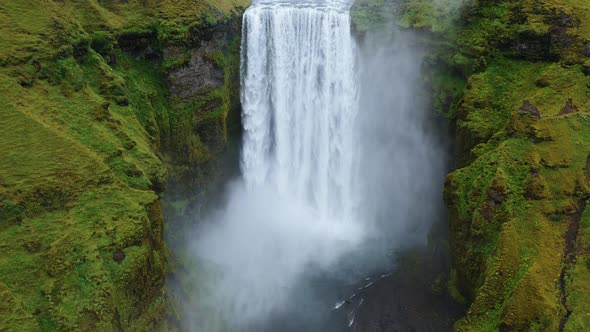 Skogafoss Waterfall on Skoga River on South Iceland in Summer  Aerial Drone Footage alt