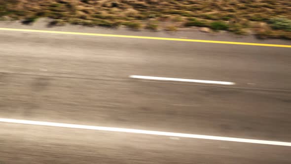 Endless road animation from the bird's eye view. Hight speed. Loopable. HD alt