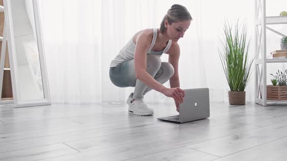 Legs Exercise Woman Athlete Remote Training Laptop alt