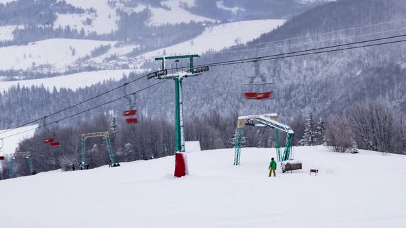 Ski Lift Skiers and Snowboarders Resort in Carpatian Mountains Time Lapse