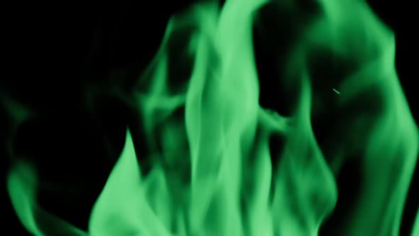 Slowmotion of Fire Line or Flames Isolated on Black Background Toned Bright Green