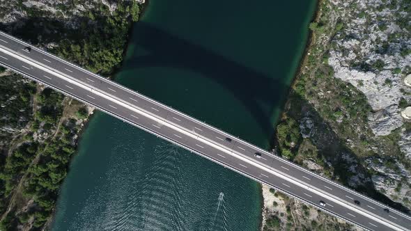Aerial top view of the autostrada bridge with traffic over Krka river in Croatia, Europe. 