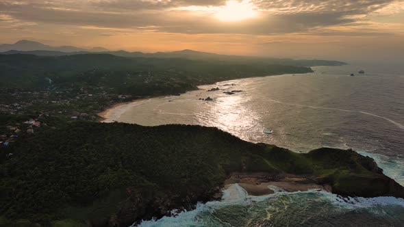Aerial Drone Above Mazunte Sunrise Ocean Shore Beach Punta Cometa Oaxaca Mexico alt