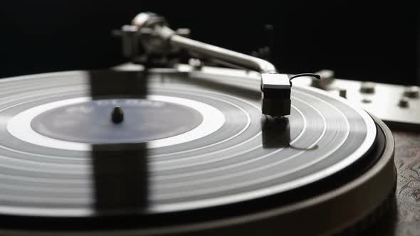 Vinyl rotating on a turntable, close up