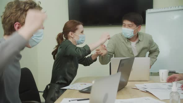 Colleagues are Clapping Hands and Throwing Up Documents alt