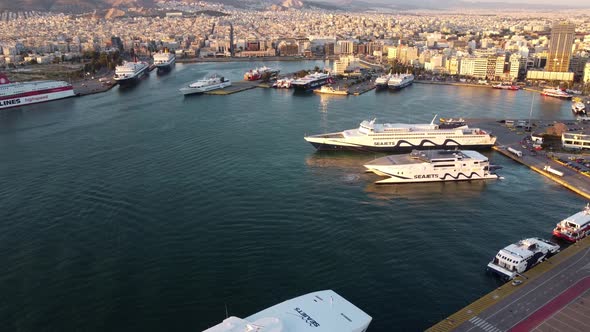 Drone View of the Port in Athens with a Panorama of the City in the Background
