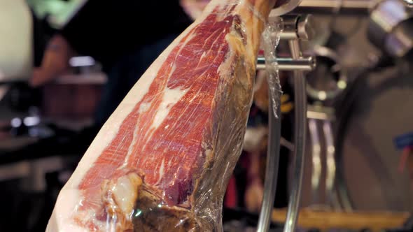 Hanging in a Row Jamon in the Store alt