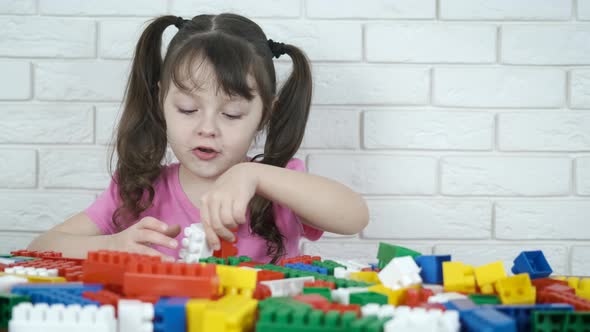 A child learns to build.  alt