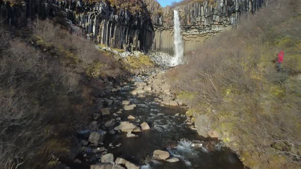 Aerial Shot of the amazing Svartifoss waterfall in Iceland. alt