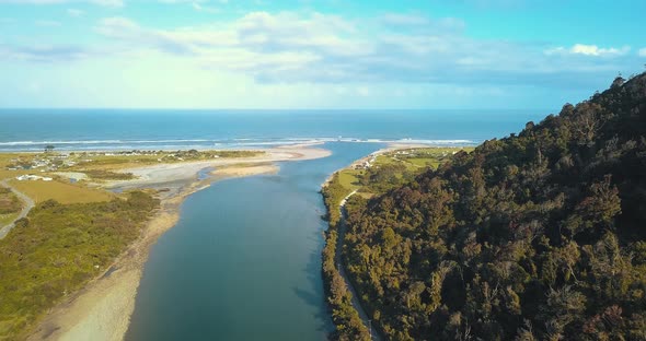 Drone View From Above of Mokihinui River and the Pacific Ocean in New Zealand  with Gentle Annie's C alt