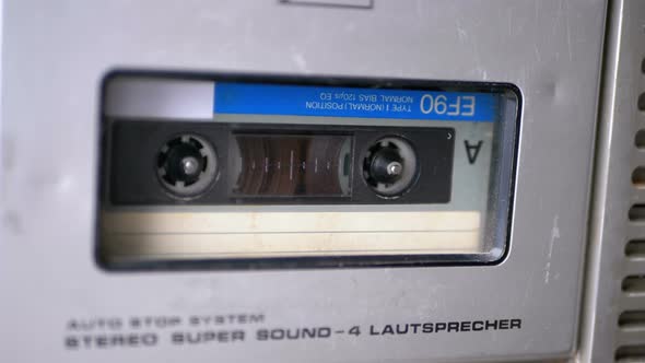 Vintage Tape Recorder Plays Audio Cassette Inserted Therein alt