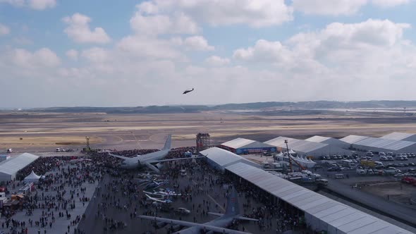 Aviation Festival Field With Crowd Old Military Aircrafts And Flying Helicopter alt