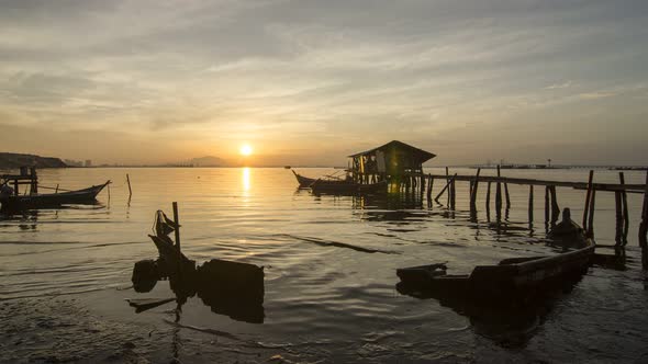 Timelapse Sunrise Dove Jetty with broken boat and wooden fisherman house alt