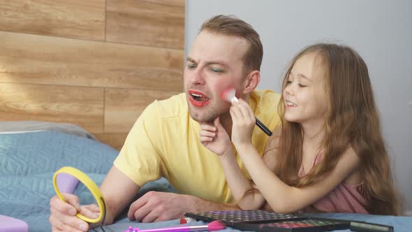 Funny Father and Kid Girl Doing Makeup Togetherhaving Fun Playing Enjoying Time with Parent at Home