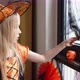 Cute Caucasian Little Girl with Blonde Hair Seven Years Old in Witch Dress and Hat Having Fun and - VideoHive Item for Sale