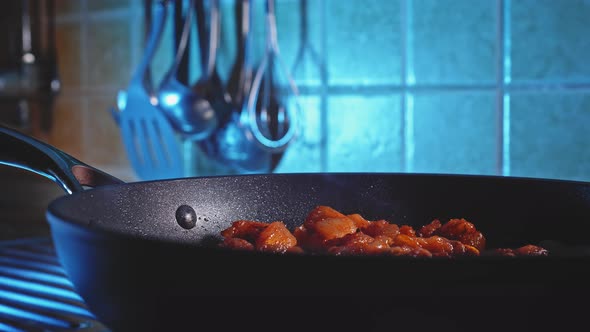 Close Up Side View Of Hot Cooked Chicken Breast In A Pan. Low-Calorie Meal Prep. slider shot alt
