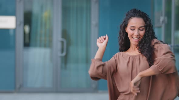 Curly Brunette Female Model Dancer with Long Hair Stylish Hairstyle Woman Girl Dances Actively Moves alt
