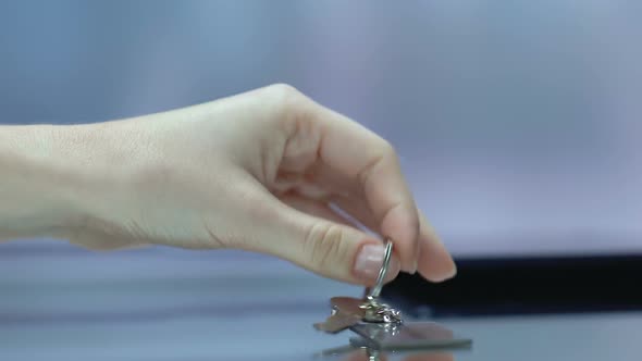 For Sale Inscription on Keychain, Woman Taking Key at Reception Desk, Realestate alt