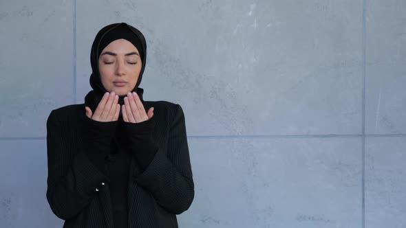 Young Muslim Woman in Hijab Praying Namaz