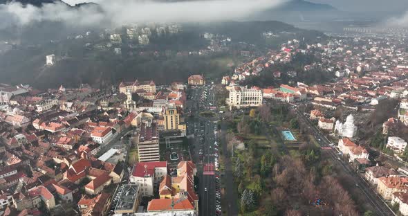 Houses and Streets in the Brasov City Under the Misty Foggy Morning in Autumn