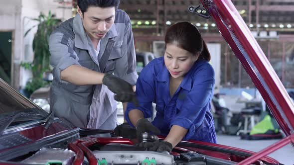 Technician checking car  alt