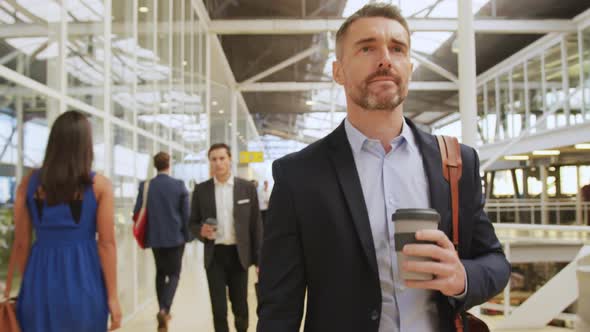 Male delegate arriving at a business convention alt
