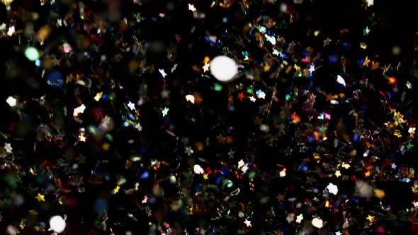Multicolored Confetti Flying After Being Exploded Particles Flying and Falling Down Black Background alt