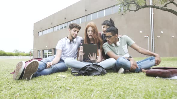 College students using digital tablet in campus