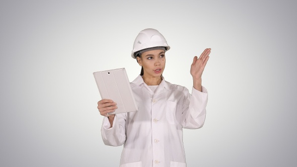 Young Female Scientist Making Video Call With Tablet on alt
