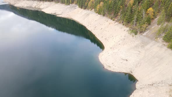 Aerial shot of a reservoir with low water levels alt