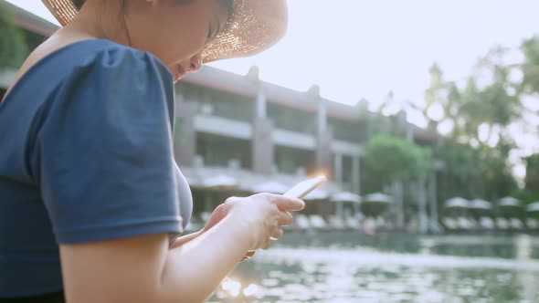 asian female traveller wear casual cloth dress enjoy vacation sunset moment alt