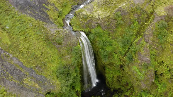 Aerial View Of Nauthusagil Waterfall In Iceland At Daytime - drone shot alt