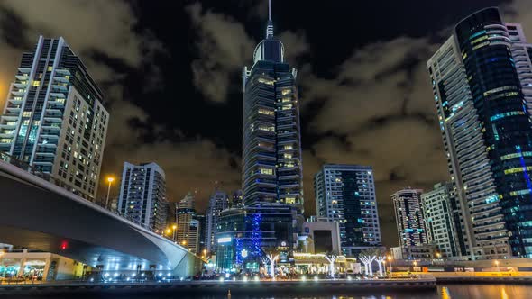 View of Dubai Marina Towers and Canal in Dubai Night Timelapse Hyperlapse alt