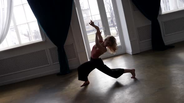 Young Female Dancer is Rehearsing Alone in Rehearsal Room Amazing Contemporary Choreography alt