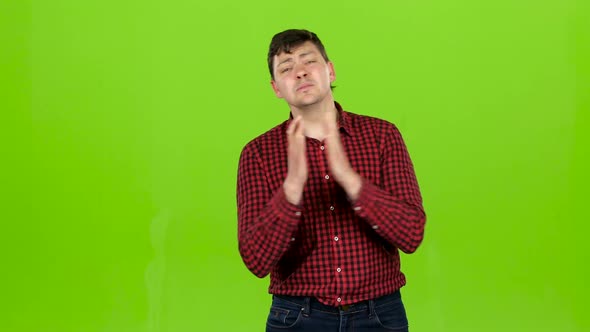 Male Fan Crosses His Fingers in His Arms, He Loses, He Is in Sorrow. Green Screen alt