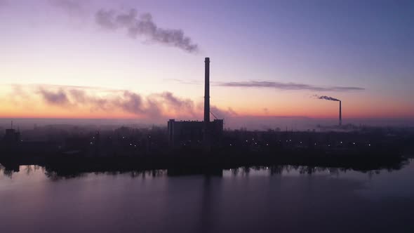 Power Plant Smokestack at Sunrise, Environmental Pollution