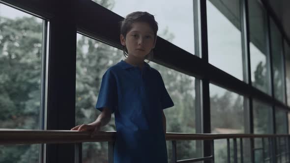 Closeup Child Face Looking Camera Unhappily alt