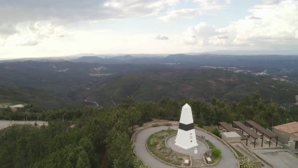 Aerial drone view of Geographical center Picoto Melrica Centro Geodesico of Portugal in Vila de Rei alt