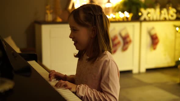 Girl Playing Piano on Christmas Eve