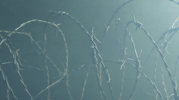 Smoke Rushes Over Barbed Wire In Urban Area alt