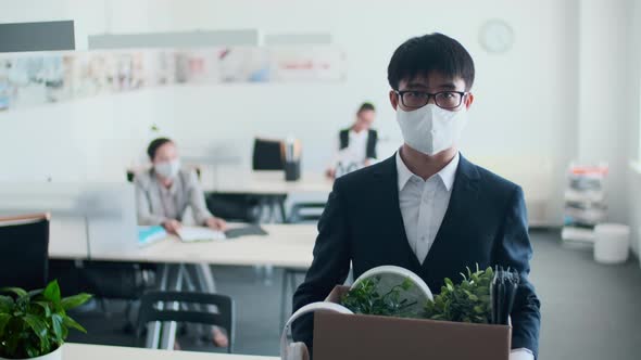Asian Male Office Worker In Mask alt