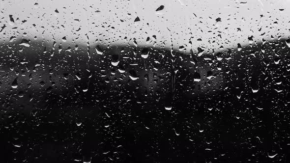 Frames Of Rain In Black And White Shades, Background Of Rain On Glass ...