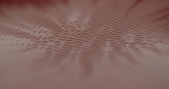 Calm dark red liquid slowly starts to form surreal shapes and patterns. macro shot of waves through alt