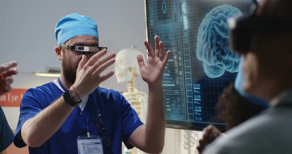 Doctor Explaining with VR Headset alt