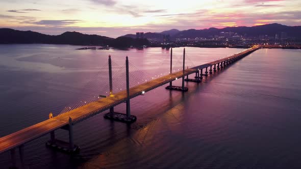 Aerial dramatic highway light of Penang Second Bridge with dramatic twilight alt