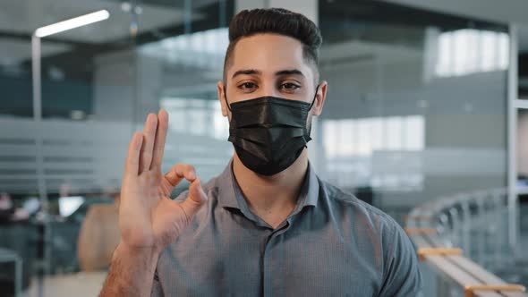 Closeup Corporate Business Portrait Arabian Indian Man Wears Black Protective Medical Face Mask alt